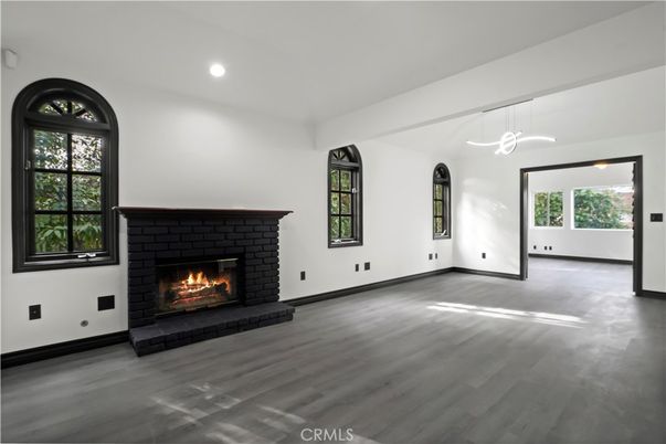 Empty room, Fireplace, Interior, Pendant Lights, Recessed Lighting, Wood Texture Flooring