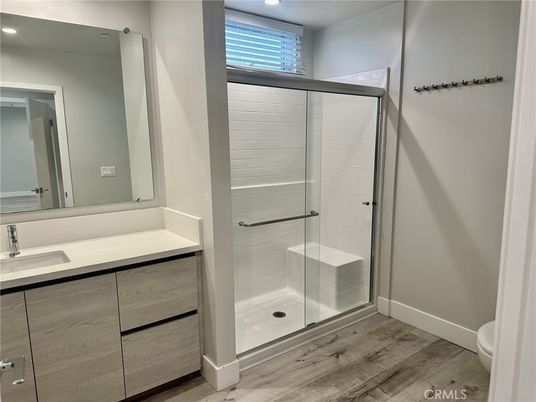 Bathroom, Glass Shower, Interior, Recessed Lighting, Wood Texture Flooring