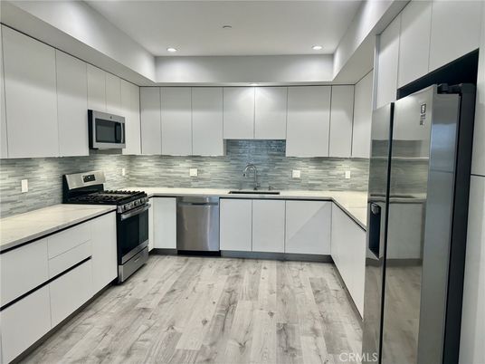 Interior, Kitchen, Recessed Lighting, Stainless Steel Appliances, Wood Texture Flooring