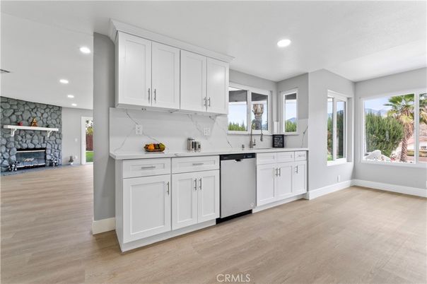 Fireplace, Interior, Kitchen, Recessed Lighting, Stone Walls, Wood Texture Flooring
