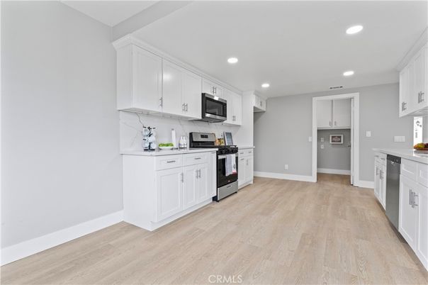 Interior, Kitchen, Recessed Lighting, Stainless Steel Appliances, Wood Texture Flooring