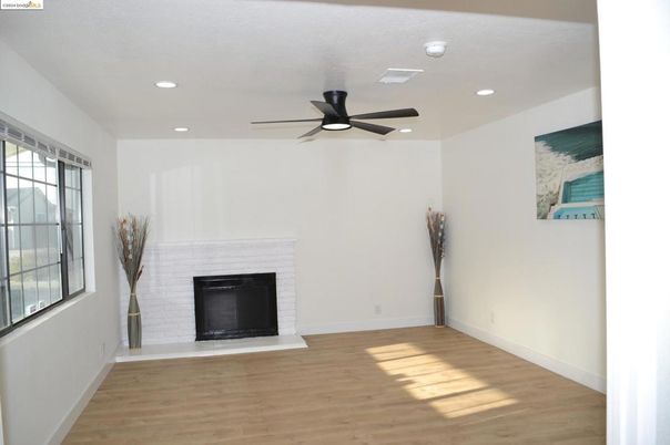 Empty room, Fireplace, Interior, Recessed Lighting, Wood Texture Flooring