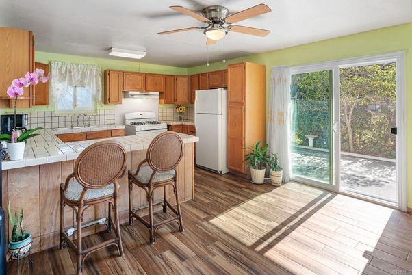 Interior, Kitchen, Tile Countertops, Wood Texture Flooring