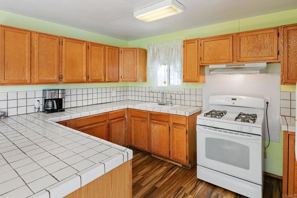 Interior, Kitchen, Tile Countertops, Wood Texture Flooring
