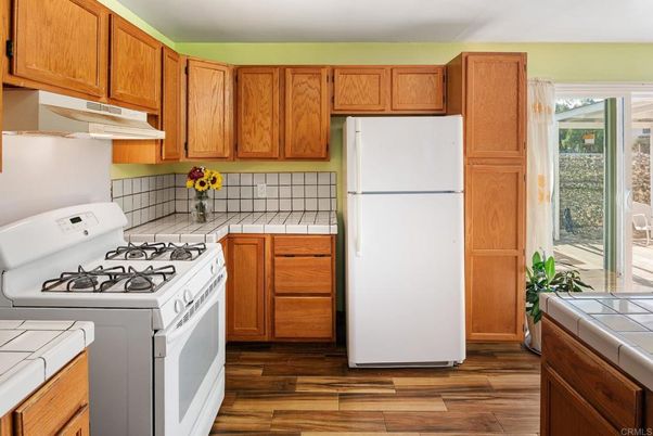 Interior, Kitchen, Tile Countertops, Wood Texture Flooring