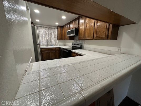 Interior, Kitchen, Recessed Lighting, Tile Countertops