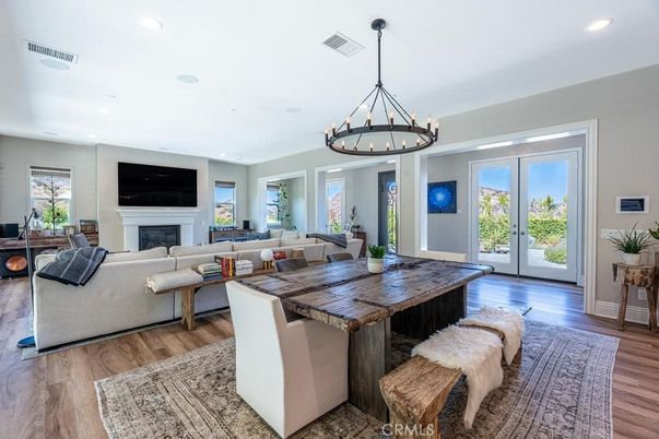 Chandelier, Fireplace, Interior, Living room, Recessed Lighting, Wood Texture Flooring