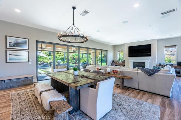 Chandelier, Fireplace, Interior, Living room, Recessed Lighting, Wood Texture Flooring