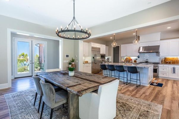 Chandelier, Interior, Kitchen, Pendant Lights, Recessed Lighting, Stainless Steel Appliances, Wood Texture Flooring