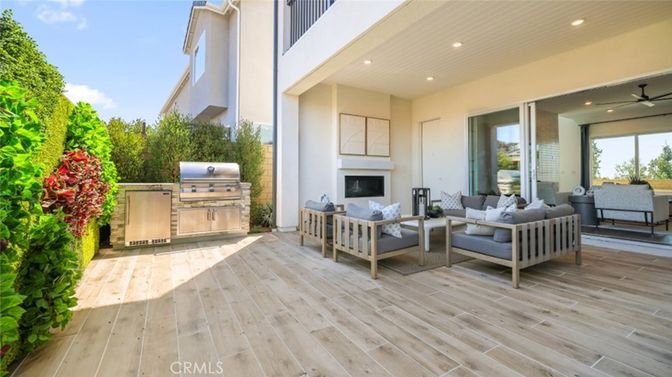 Exterior, Fireplace, Recessed Lighting, Wood Texture Flooring