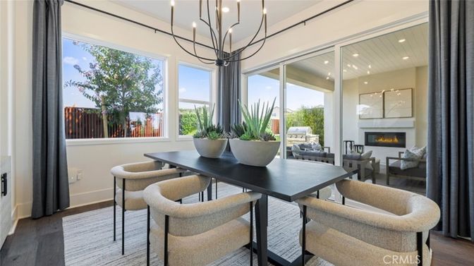 Chandelier, Dining room, Fireplace, Interior, Living room, Recessed Lighting, Wood Texture Flooring