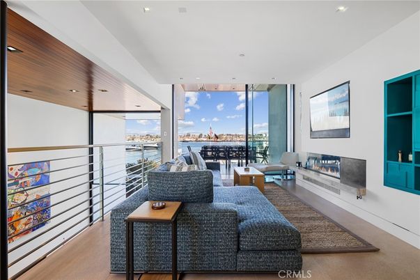 Fireplace, Interior, Living room, Recessed Lighting, Water, Wooden Ceilings, Wood Texture Flooring