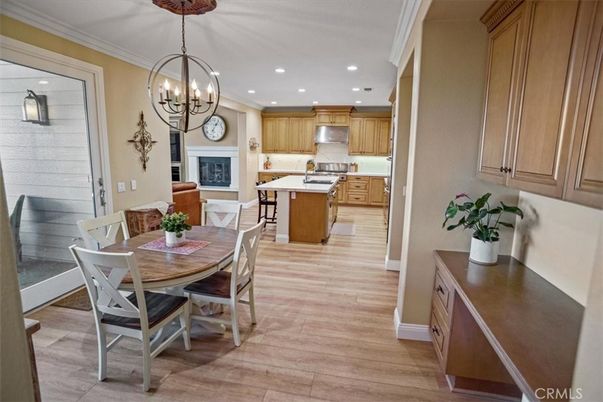Chandelier, Dining room, Fireplace, Interior, Kitchen, Pendant Lights, Recessed Lighting, Wood Texture Flooring