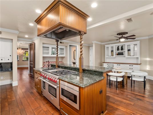 Chandelier, Dining room, Interior, Kitchen, Recessed Lighting, Stainless Steel Appliances, Wood Texture Flooring
