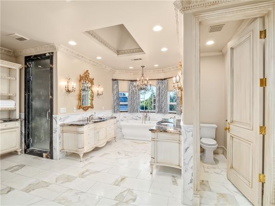 Bathroom, Chandelier, Dual Sink Vanities, Free Standing Baths, Interior, Marble, Recessed Lighting