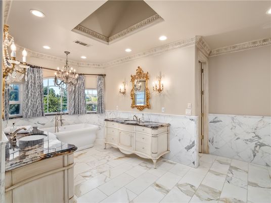 Bathroom, Chandelier, Dual Sink Vanities, Free Standing Baths, Interior, Marble, Marble Walls, Recessed Lighting