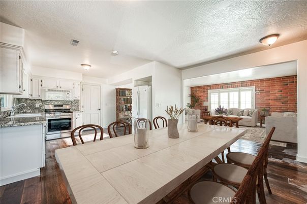 Dining room, Interior, Kitchen, Living room, Stainless Steel Appliances, Stone Walls, Wood Texture Flooring