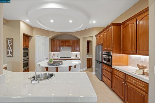 Interior, Kitchen, Recessed Lighting, Stainless Steel Appliances, Tile Countertops