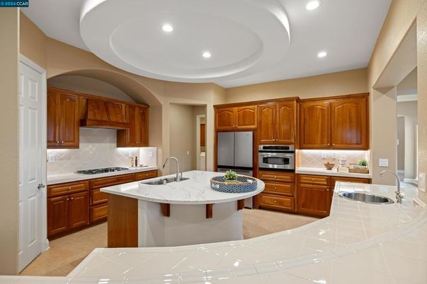 Interior, Kitchen, Recessed Lighting, Stainless Steel Appliances, Tile Countertops