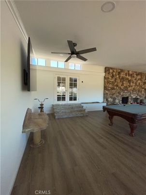 Billiard Table, Fireplace, Game Room, Interior, Stone Walls, Wood Texture Flooring