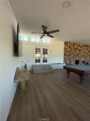 Billiard Table, Fireplace, Game Room, Interior, Stone Walls, Wood Texture Flooring