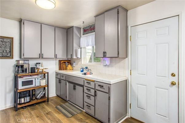 Interior, Kitchen, Tile Countertops, Wood Texture Flooring