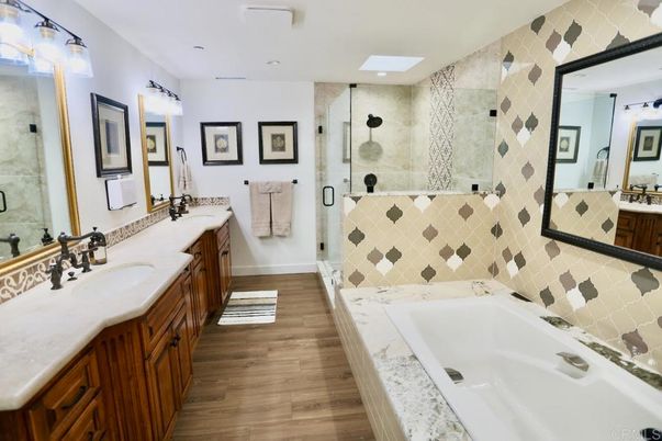 Bathroom, Dual Sink Vanities, Glass Shower, Interior, Recessed Lighting, Wood Texture Flooring