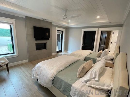 Bedroom, Fireplace, Interior, Recessed Lighting, Wood Texture Flooring