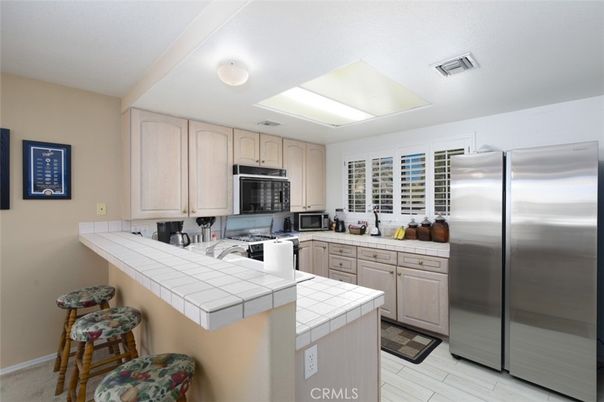 Interior, Kitchen, Stainless Steel Appliances, Tile Countertops