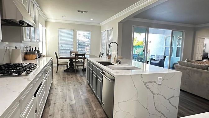 Dining room, Interior, Kitchen, Recessed Lighting, Stainless Steel Appliances, Wood Texture Flooring