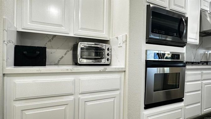 Interior, Kitchen, Marble Walls, Stainless Steel Appliances
