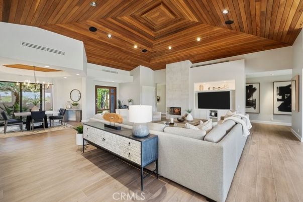 Dining room, Fireplace, Interior, Living room, Pendant Lights, Recessed Lighting, Wooden Ceilings, Wood Texture Flooring