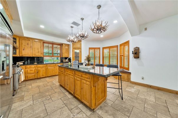 Chandelier, Dining room, Interior, Kitchen, Pendant Lights, Recessed Lighting, Stainless Steel Appliances
