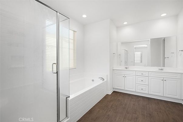Bathroom, Dual Sink Vanities, Glass Shower, Interior, Recessed Lighting, Wood Texture Flooring