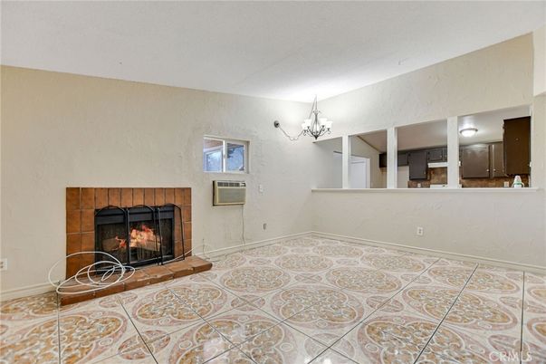 Chandelier, Empty room, Fireplace, Interior