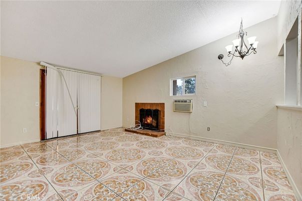 Chandelier, Empty room, Fireplace, Interior