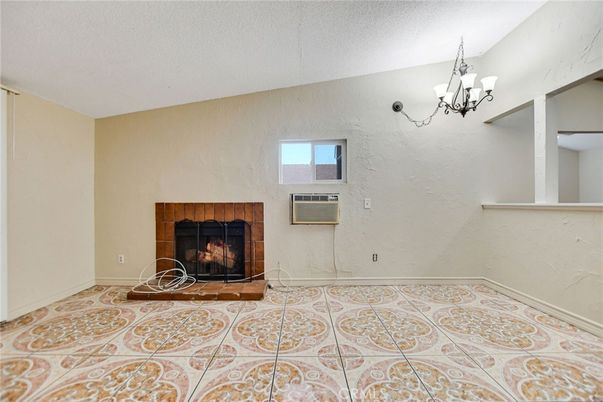 Chandelier, Empty room, Fireplace, Interior