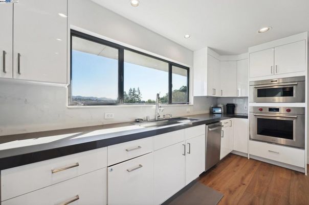 Interior, Kitchen, Recessed Lighting, Stainless Steel Appliances, Wood Texture Flooring