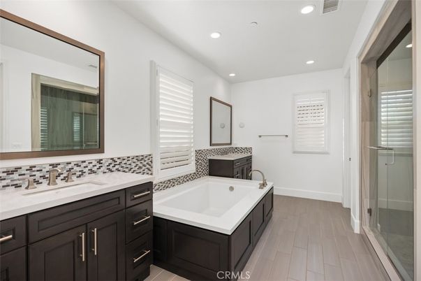 Bathroom, Dual Sink Vanities, Interior, Recessed Lighting, Wood Texture Flooring