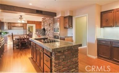 Dining room, Interior, Kitchen, Recessed Lighting, Stainless Steel Appliances, Wooden Beams, Wood Texture Flooring