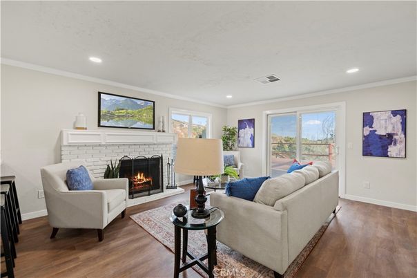 Fireplace, Interior, Living room, Recessed Lighting, Wood Texture Flooring