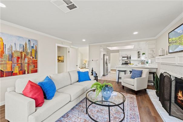 Fireplace, Interior, Kitchen, Living room, Recessed Lighting, Stainless Steel Appliances, Wood Texture Flooring