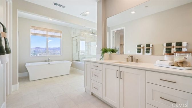Bathroom, Dual Sink Vanities, Free Standing Baths, Glass Shower, Interior, Marble Walls, Recessed Lighting
