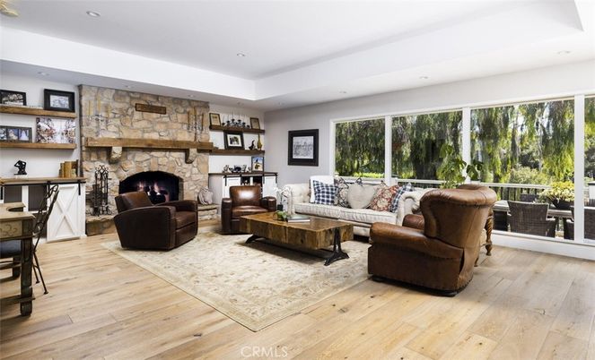 Fireplace, Interior, Living room, Recessed Lighting, Stone Walls, Wood Texture Flooring