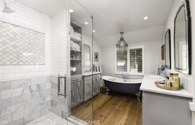 Bathroom, Dual Sink Vanities, Free Standing Baths, Interior, Pendant Lights, Recessed Lighting, Wood Texture Flooring