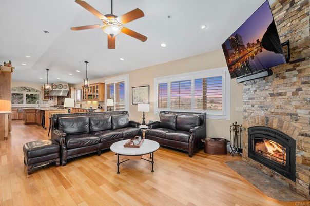 Fireplace, Interior, Kitchen, Living room, Pendant Lights, Recessed Lighting, Stone Walls, Wood Texture Flooring