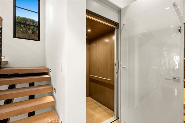 Elevator, Interior, Recessed Lighting, Wooden Ceilings, Wood Texture Flooring, Wooden Walls