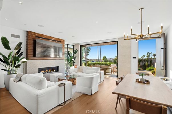 Dining room, Fireplace, Interior, Living room, Pendant Lights, Recessed Lighting, Wood Texture Flooring