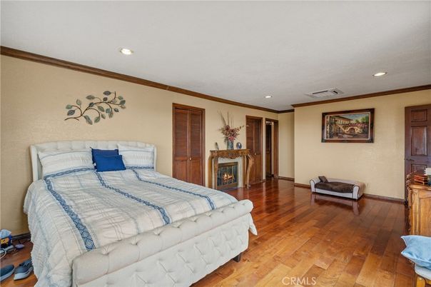 Bedroom, Fireplace, Interior, Recessed Lighting, Wood Texture Flooring