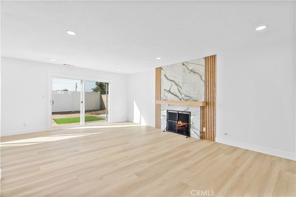 Empty room, Fireplace, Interior, Recessed Lighting, Wood Texture Flooring